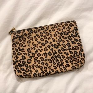 Super cute animal print zip clutch!